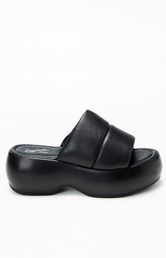 Step up your footwear game with Seychelles' Women's Sorry 'Bout It Sandals. These puffy platform sandals are a contemporary standout, perfect for any occasion. With a cushioned insole and padded solid strap, they offer both style and comfort. Available in an array of colors, these wedges will elevate your look and take you places you've only dreamed of.Heel Height: 2.75”Platform: 2”Material: LeatherFit: True to sizeToe Shape: RoundSlip-on style Seychelles Womens Women's Sorry 'Bout It Sandals - Black size 7 Slim Fit Cargo Pants, Elevate Your Look, Slim Fit Pants, Slim Pants, Seychelles, Slim Fit Jeans, Pacsun, Platform Sandals, Black Sandals