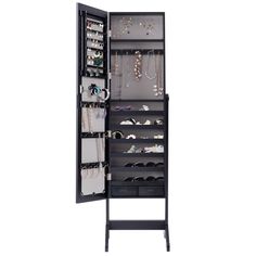 an open black jewelry cabinet with many necklaces