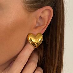 Noir Heart Earrings Material: 18K Gold Plated over Premium 316L Stainless Steel Care: Water/ Sweat Resistant (No Discoloration or Tarnishing) Cherry Lady, Gold Heart Stud Earrings, Gold Heart Earrings, Cool Ear Piercings, Gold Heart Studs, Gold Heart Earring, Diamond Huggies, Wedding Inspired, Chunky Earrings