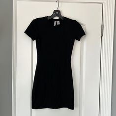 Size Xs Nwot Worn Twice A Bit Too Tight For Me Black Crew Neck Bodycon Dress For Summer, Fitted Black T-shirt Dress Mini Length, Casual Black Bodycon Dress With Crew Neck, Casual Black Crew Neck Bodycon Dress, Black Crew Neck Bodycon Dress, Casual Fitted Black T-shirt Dress, Fitted Black T-shirt Dress For Spring, Black Bodycon Mini Dress With Crew Neck, Black Short Sleeve Bodycon Dress