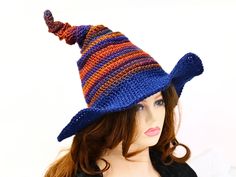 Ready for the Renfaire, a festival, cosplay, a witch gathering, your table centerpiece, or just plain fun, this quirky fairy witch hat is firmly shaped but soft to wear. Do you like to put a bit of fun in your spell casting or capture that impish look with your outfits? This hat is full of character and sure to help express a bit of that impish quirky fun! I've done this one in Fall colors and shaped it with a stacked twisted tip. The quirky wide brim has an open weave stitch for ventilation, giving it an airy mesh look, and done in a midnight sparkle blue lending a night sky feel. The way I stitch allows you to twist and shape or return it to straight up. The brim is wired and can be made more or less funky in shape. When you're not wearing it, you can toss it on your table for a great ce Adjustable Costume Hats And Headpieces, Witchy Adjustable Mini Hats For Cosplay, Adjustable Witchy Mini Hat For Cosplay, Brimmed Costume Hats And Headpieces, Adjustable Halloween Costume Hat, Curved Brim Costume Hat, Costume Hat With Curved Brim, Fantasy Hat For Cosplay, Adjustable Costume Hat One Size