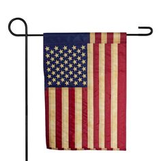 an american flag hanging on a clothes line