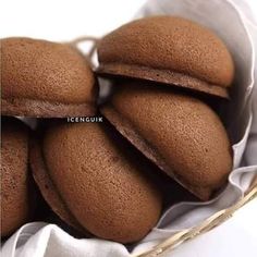 a basket filled with cookies on top of a white table