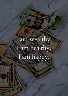 stacks of money sitting on top of each other with the words i am healthy i am healthy