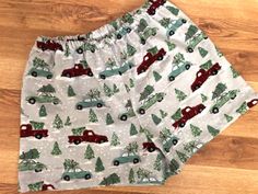 "ATTENTIONWE ARE AT FULL CAPACITY FOR  DELIVERY BY CHRISTMAS FOR 2023 . You can still place an order, however..we can not guarantee that it will ship, or that you will  receive it by Christmas Day!Listing is one pair of Shorts!  You can find the matching pants here: https://www.etsy.com/listing/1268592610/vintage-christmas-flannel-pajama-pants?click_key=6e98193e2b95a4749cd9c606aa12bf72a0eaf72e%3A1268592610&click_sum=5dcf24df&ref=shop_home_active_2&frs=1&sts=1 - 100% Cotton Flannel - 1/2 inch elastic waistband - available w/wo a bow accent at waist -Handmade here in Virginia by me. How do you find your size????? measure your hips and then look at \"my\" size chart, Women's Waist: XS (25-27) S(28-29) M(29-30 L(31-32) XL(32-33) XXL(34-36) inches Hips; XS(31-33) S( 35-37) M(39-40) L(41-43) XL( Vintage Truck Christmas, Christmas Pj, Christmas Flannel, Flannel Pajama Pants, Pj Shorts, Christmas Pajama Set, Flannel Pants, Flannel Pajamas, Sleep Shorts