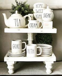 a shelf with tea cups and saucers on it, labeled home sweet mom sugar and grace