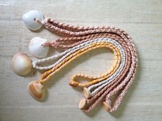 "These sweet shell necklaces are crocheted with mercerized cotton and have a button closure. They are perfect to wear to the beach! The shells were found on my local beach in Jupiter, Florida. Wash by hand with a small amount of liquid soap and lay flat to dry. The necklaces are between 18\" and 19-1/2\" inches in length, the exact measurement of each necklace is indicated in the necklace choice box. The width of the tan/ecru necklace is 3/8\" and the other necklaces are 1/4\" wide. The shells a Adjustable Crochet Necklace For Beach, Adjustable Crochet Necklaces For The Beach, Surfer Girl Costume, Mermaid Shell Necklace, Sea Crochet, Crochet Ocean, Boho Music, Starfish Hair Clip, Paracord Necklace