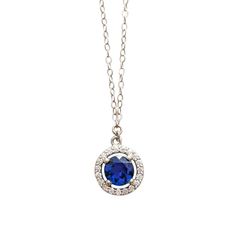 A gorgeous blue sapphire sparkles in the light, accented by a circle of diamonds. Set in 14k white gold, this is the prettiest sapphire necklace you may ever see! Handcrafted in 14k white gold Features a sapphire surrounded by a diamond halo Sapphire measures approx. 5.5mm in diameter Pendant measures approx. 10mm in diameter Full necklace hangs at 18" with a 14k lobster clasp Cornflower Blue Sapphire, Pastel Necklace, Jewel Design, Blue Sapphire Pendant, True Summer, Halo Necklace, Accesories Jewelry, Ceylon Sapphire, Diamond Pendants