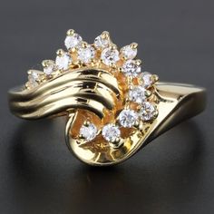 This Ring Is Made Of 14 Karat Yellow Gold And Contains 15 Round-Cut Diamonds (0.36ctw) Placed Within A Swirled Setting Design. The Band Is A Size 6.5 And Has "14kp" Stamped Onto The Inner Part Of It. Produced By Rings O' Romance. Size: 6.5 Weight: 2.27dwt/3.53g Metal: 14 Karat Yellow Gold Stones: Diamonds (0.36ctw) I-2770* E-884 Swirl Diamond Ring, Swirl Ring, Round Cut Diamond, Womens Jewelry Rings, Gold Diamond, Swirl, Vintage Jewelry, Diamonds, Romance