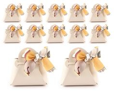 twelve small bows are placed on top of each other in the shape of bell bells