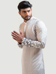 This Grey Gradient Leaf kurta set will instantly give an elegant look. This 2 piece kurta set features a linen satin grey kurta, gradient leaf embroidery, invisible front button placket, and a mandarin collar. It is paired with narrow fitted pajama pants in black color and malai cotton fabric. An ideal outfit for traditional occasions, and special events.

Size Chart For Men





	
	
					Men's Size Chart
		

		
		
						
				Size Chart For Men
				Custom Size Measurement Guide Festive Linen Kurta For Eid, Traditional Linen Kurta For Eid, Unstitched Linen Kurta For Eid, Diwali Linen Straight Kurta, Festive Unstitched Linen Kurta, Elegant Spring Bandhgala Straight Kurta, Festive Long Sleeve Linen Sets, Spring Festive Linen Kurta, Festive Fitted Linen Kurta