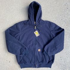 Nwt Carhartt J130 Quilted Flannel-Lined Sandstone Duck Active Jacket - "Midnight" Blue (Mdt) - Size Medium Tall New With Tags! Discontinued Style. Product Features 12-Ounce, 100% Sandstone Cotton Duck Micro-Sanded, Then Garment-Washed For A Soft Hand Feel 100% Polyester Quilted Flannel Lining In Body; Quilted Nylon Lining In Sleeves Attached Quilted Flannel Lined Hood With Drawstrings Two Inside Pockets Two Large Lower Front Hand-Warmer Pockets Triple Stitched Main Seams Rib-Knit Cuffs And Waistband Approximate Measurements (Taken Flat) Chest (Pit To Pit): 26" Length (Back Neck Seam To Bottom Hem): 30” Shoulder (Shoulder Seam To Shoulder Seam Carhartt Jackets, Carhartt Jacket, Men Carhartt, Active Jacket, Front Hand, Soft Hands, Flat Chest, Soft Hand, Navy Color