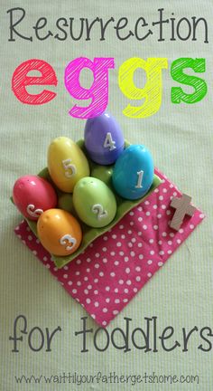 an easter egg hunt for toddlers with colored eggs in a basket and numbers on it