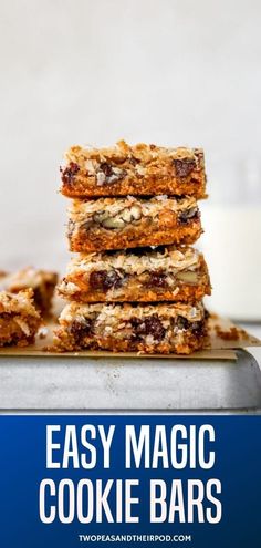 easy magic cookie bars stacked on top of each other with text overlay that reads easy magic cookie bars