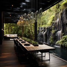 an outdoor dining area with wooden tables and hanging glass chandeliers over the waterfall