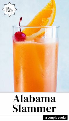 an orange drink in a tall glass with a cherry on top