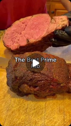 the meat prime is being prepared to be cut into pieces and put in an oven