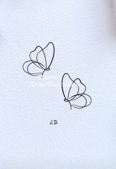 two hearts are drawn on paper with the initials j and d written in black ink