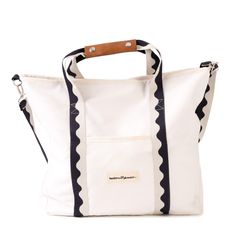 Studio image of riviera white cooler tote Canvas Bags With Top Carry Handle For Outdoor, Outdoor Canvas Bag With Top Carry Handle, Practical Canvas Bag For Weekend Trips, Practical Tote Lunch Bag For Travel, Practical Travel Tote Lunch Bag, Rectangular White Lunch Bag For Travel, White Travel Canvas Bag With Removable Pouch, White Canvas Bag With Removable Pouch For Travel, White Canvas Travel Bag With Removable Pouch