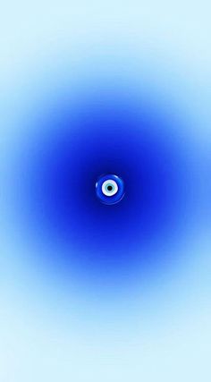 an image of a blue object in the middle of the sky with white circles around it