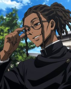 a man with glasses and dreadlocks standing in front of trees