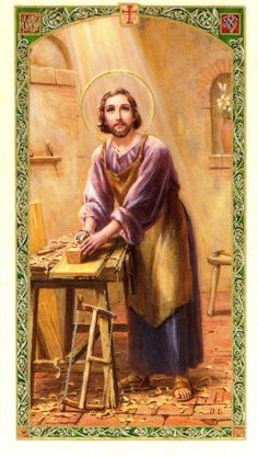 the image shows jesus standing at a table with his hands on a wooden block and looking down