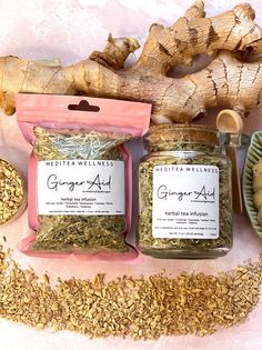 the ingredients for ginger - aid are laid out next to each other on a table