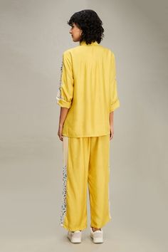 Yellow shirt with floral applique embroidery. Paired with chanderi pant. - Aza Fashions Spring Cotton Palazzo Set With Mirror Work, Festival Embroidered Straight Kurta Set, Festive Designer Cotton Bottoms, Designer Cotton Palazzo Set With Straight Pants, Spring Cotton Silk Sets With Mirror Work, Cotton Set With Embroidered Sleeves For Eid, Festive Designer Cotton Pants, Straight Kurta Set With Embroidered Sleeves For Diwali, Festive Cotton Sets With Embroidered Sleeves