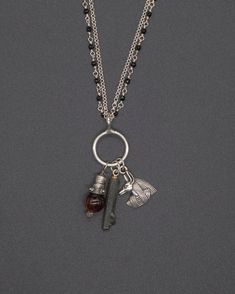 This multi-charm necklace has a silver Anubis charm, black phantom quartz, and a silver capped tiger eye orb, paired with a beautiful tandem onyx double chain. The chain is 65 cm long [app 26 in long] Black Sterling Silver Necklace With Charms, Silver Caps, Phantom Quartz, The Chain, Double Chain, Tandem, Healing Stones, Tiger Eye, Handcrafted Jewelry