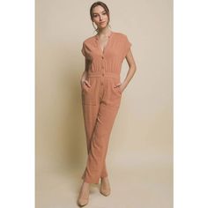 Get The Best Of Both Worlds With Our Comfy-Chic V-Neck Pocketed Jumpsuit. The Perfect Combination Of Style And Comfort, This Jumpsuit Has A Flattering V-Neckline And Functional Pockets For A Touch Of Practicality. Fabric Contents: 85% Rayon, 15% Linen **Color May Vary Slightly Due To Image And Screen Lighting** *In Stock Ships Approx. Within 8 Bus Days After Purchase From Ca** * If Purchased Through Website Ships Free And Faster Delivery Time* Spring Brown V-neck Jumpsuits And Rompers, Orange Jumpsuits And Rompers For Work, Orange Fitted Chic Jumpsuits And Rompers, Chic Orange Fitted Jumpsuits And Rompers, Fitted Orange Jumpsuits And Rompers For Work, Fitted Orange Jumpsuits For Work, Brown V-neck Jumpsuits And Rompers For Spring, Spring Brown V-neck Jumpsuit, Brown Jumpsuits