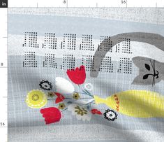 a close up of a piece of fabric with flowers on it and a measuring tape