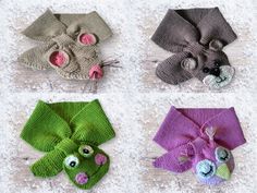 four crocheted scarves with eyes and bows on them, all in different colors