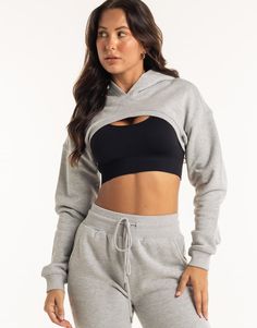 Meet the High Cut Hoodie, the perfect layering piece that deserves to be a part of the all-year rotation. The ultra cropped length is the High Cut Hoodie's best attribute, great for showing off your sportsbra and/or bikini. Add in a hoodie and you've got a top that can provide style and warmth - Super soft cotton/polyester blend - In-trend ultra cropped silhouette - Large hood - Designed to flatter every size - Worn by our inhouse team for the perfect fit 62% Cotton, 38% Polyester Bella is wearing a Small She is 170cm (5'6") tall with an 33" bust, a 25" waist and 36" hip Stretch Cropped Activewear For Winter, Winter Cropped Stretch Activewear, Fitted Cropped Athleisure Hoodie, Sporty Stretch Hoodie For Layering, Cropped Athleisure Activewear For Streetwear, Cropped Winter Sports Activewear, Winter Cropped Athleisure Activewear, Stretch Cropped Sweatshirt Athleisure, Trendy Cropped Sports Bra For Loungewear