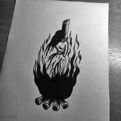 a black and white drawing of a burning hand