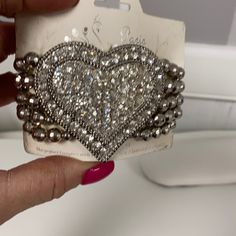 Women's Crystal Heart Rhinestone Bracelet Stretch Band Beautiful Bracelet New Never Worn Elegant Silver Heart Bracelet With Rhinestones, Elegant Heart-shaped Metal Beaded Bracelets, Silver Rhinestone Bracelets For Valentine's Day, Silver Beaded Heart-shaped Bracelets, Elegant Rhinestone Bracelets For Valentine's Day, Silver Beaded Heart Bracelet, Elegant Metal Beaded Bracelets For Valentine's Day, Heart-shaped Silver Beaded Bracelets, Valentine's Day Silver Bracelets With Rhinestones