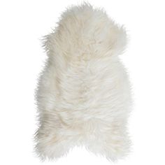 a white sheepskin rug on a white background