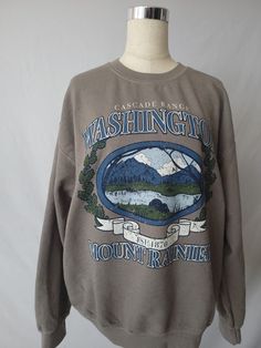 Vintage Mountain Sweatshirt, Oversized Graphic Print Sweatshirt For Outdoor, Oversized Acid Wash Vintage Sweatshirt, Acid Wash Sweatshirt With Graphic Print, Vintage Oversized Acid Wash Sweatshirt, Oversized Crew Neck Sweatshirt For Outdoor, Oversized Vintage Washed Sweatshirt, Vintage Oversized Washed Sweatshirt, Casual Acid Wash Sweatshirt With Graphic Print