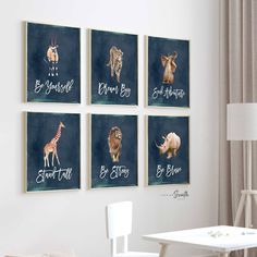 four different animals are hanging on the wall next to a white chair and table in front of a window