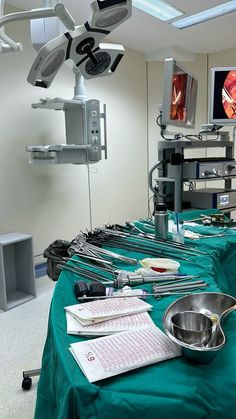 an operating room with surgical equipment on the table