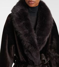 Find NOUR HAMMOUR Isadora Shearling Coat on Editorialist. Material: 100% lamb fur. Care instructions: specialist clean. Made in Turkey. Designer color name: Chocolat Fondant. Closure: belted waist. Luxury Formal Fur Coat With Faux Fur Trim, Luxury Formal Fur Coat With Faux Fur Lining, Luxury Mink-colored Fur Coat With Faux Fur Lining, Sheepskin Fur Coat With Faux Fur Trim For Work, Luxury Sheepskin Outerwear In Mink Color, Luxury Mink Shearling Fur Coat, Designer Sheepskin Fur Coat With Faux Fur Lining, Luxury Sheepskin Fur Coat With Faux Fur Trim, Luxury Shearling Fur Coat With Faux Fur Trim