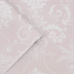 a white wallpaper with an ornate design on it's back end and side