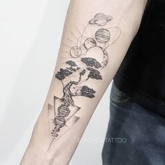 a person with a tattoo on their arm