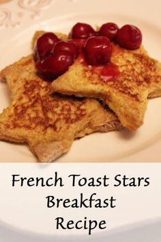 french toast stars on a white plate with cherries