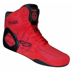 a pair of red and black shoes with the word ottomx on it's side