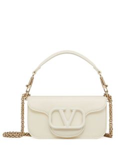 Luxury White Flap Bag With Top Handle, Luxury White Top Handle Flap Bag, White Luxury Flap Bag With Gold-tone Hardware, White Evening Bag With Metal Logo, White Shoulder Bag With Metal Logo For Evening, Luxury White Flap Bag With Chain Strap, White Formal Flap Bag With Branded Hardware, White Formal Flap Bag With Chain Strap, Formal White Flap Bag With Branded Hardware