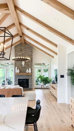 a living room filled with furniture and a fire place