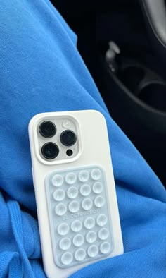 an iphone case with buttons attached to it