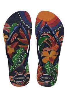 Open toe flip flopsSlip-on designSlim Havaianas strapsHavaianas metal logoCushioned footbed with textured rice pattern and rubber soleFlexible premium Brazilian rubberStrap: 100% PVCLogo: 100% ZamakOutsole: 100% RubberMade in Brazil Hawaiian Sandals, Beach Vacation Accessories, Slim Logo, Surfboard Bag, Tropical Design, Camping Accessories, Metallic Logo, Navy Color, Tropical Print