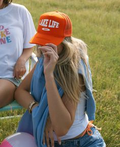 Orders are shipped within 7-10 business days. We highly suggest utilizing UPS if you are in a time crunch and want a faster delivery date. All of our products are handmade to order. Thank you for shopping small with us! Casual Orange Trucker Hat For Outdoor, Trendy Orange Trucker Hat For Summer, Casual Adjustable Orange Trucker Hat, Everyday Summer Trucker Hat, Casual Orange Trucker Hat, Casual One-size Hats For Gifts, Mother Knows Best, Lake Life, Meet The Team