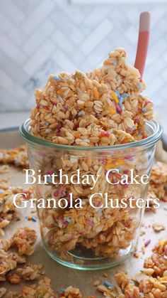 birthday cake granola clusters in a glass container